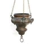 A 19th century bronzed hanging planter with cherub masks, 35cms (13.75ins) high.