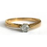 A 9ct gold .30ct. diamond solitaire ring, approx UK size 'M'.