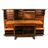 A mid 20th century design teak bureau, the pair of doors opening to reveal a fitted interior,