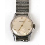 A Movado 1950/1960's gentleman's wristwatch with Arabic numerals and subsidiary seconds dial.