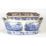 A 19th century blue & white two-handled foot bath, 47cms (18ins) wide.Condition Report