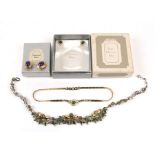 A quantity of Christian Dior costume jewellery to include necklaces and earrings, in original