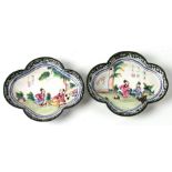 A pair of Chinese enamel dishes of lobed form decorated with figures and calligraphy, 9.5cms (3.