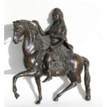 After Francois Girardon - a bronze group depicting Louis XIV seated on horseback, 43cms (17ins) high