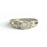 A 9ct white gold five stone diamond ring. Approx UK size J