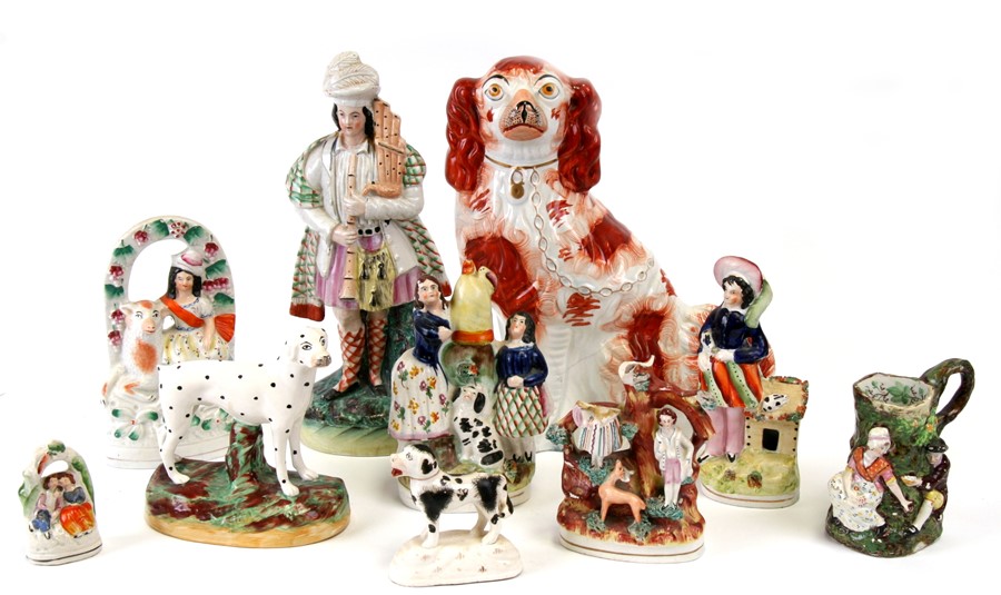 A quantity of 19th century Staffordshire Pottery groups including figures and animals (10).