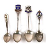 Four silver and enamel teaspoons.