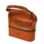A Finnigan's leather travel bag.