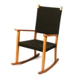 A mid 20th century rocking chair.