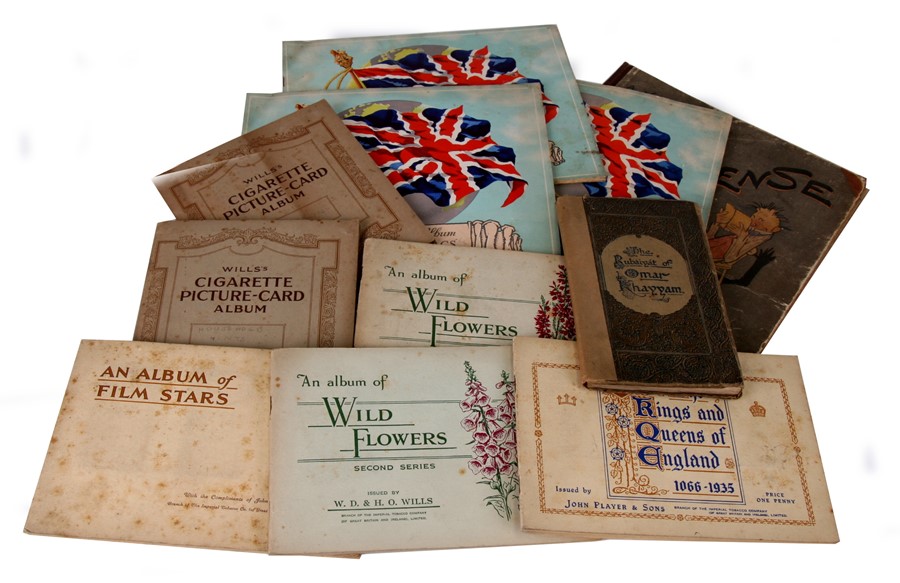 A quantity of Wills and Players cigarette cards and other items.