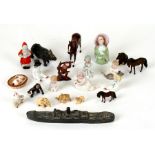 A group of Victorian bisque figural cake decorations to include Father Christmas and a quantity of