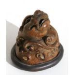 A Chinese bamboo incense burner on stand in the form of a coiled dragon, 9cms (3.5ins) high.