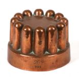 A Victorian W & B copper jelly mould, numbered 262, 9cms (3.5ins) diameter.