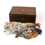 A quantity of costume jewellery including a silver buckle and coral stick necklace with 9ct gold