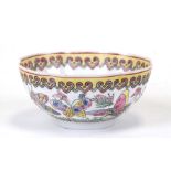 A Chinese famille rose eggshell bowl decorated with butterflies and flowers, four character red seal