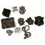 A quantity of silver letter mounts; together with a blank silver cartouche and other items.