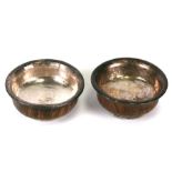 A pair of Tibetan white metal mounted burr maple Mazer bowls, 11cms (4.25Ins) diameter.