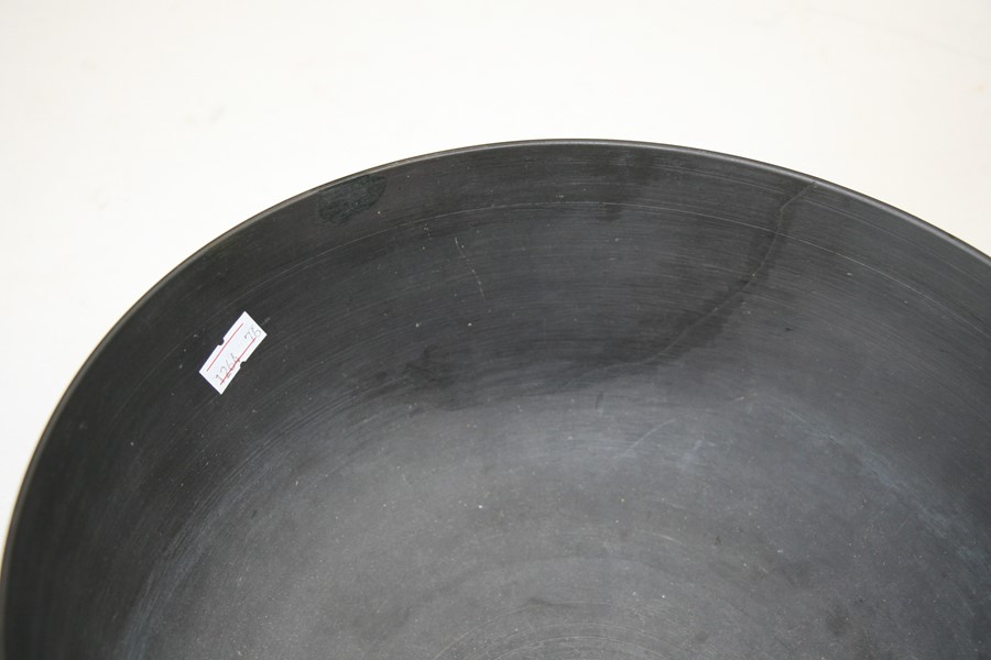 A Wedgwood black basalt bowl decorated with flowers and foliage, 28cms (11ins) diameter (restored). - Image 3 of 6