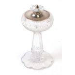 A cut glass bonbon dish with silver lid, Birmingham 1911, 20cms (8ins) high.