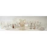 A quantity of cut glass vases and jugs.