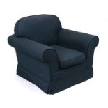 A modern blue upholstered armchair.