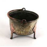 A 17th / 18th century copper & brass three-legged cauldron of small proportion, 22cms (8.5ins)