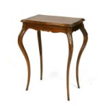 A continental walnut occasional table, 55cms (21.5ins) wide.