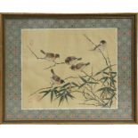 A Chinese painting on silk depicting birds amongst bamboo, framed and glazed. 33 by 28cm (13 by 11