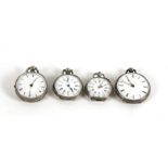 A group of four silver cased open faced fob watches.