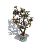 A large Chinese gem tree with carnelian fruit in a cloisonne planter, 73cms (28.75ins) high.