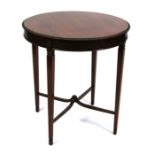 An Edwardian mahogany circular occasional table with Greek key frieze, on square tapering legs,