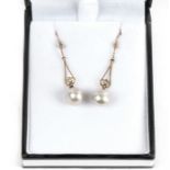 A pair of 9ct gold pearl drop earrings.