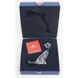 A Swarovski crystal model of a cat, boxed with certificate, 12cms (4.75ins) high.
