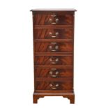 A flame mahogany reproduction three-drawer filing cabinet with keys, 52cms (20.5ins) wide.