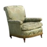 A late 19th century Howard style upholstered armchair on turned front supports.Condition Report