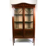 An Edwardian inlaid mahogany two-door glazed display cabinet, 92cms (36ins) wide.