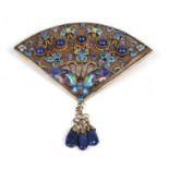 A Chinese silver filigree enamel and Lapis Lazuli fan shaped brooch decorated with butterflies, 7cms