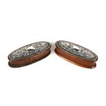 A pair of Edwardian oval mahogany silver mounted trinket boxes, Chester 1907, 15cms (6ins) wide.
