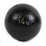 An 18th/19th century cast iron 14lb round shot cannon ball. Approximate diameter 11cms (4.25ins)