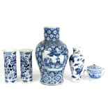 A Chinese blue & white vase decorated with figures and flowers within panels, 32cms (12.5ins)