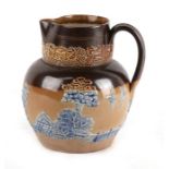 A Doulton Stoneware jug decorated with a Chinese landscape scene, 16cms (6.25ins) high.