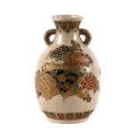 An Imperial Japanese Satsuma two-handled vase decorated with flowers and fans, 9cms (3.5ins) high.