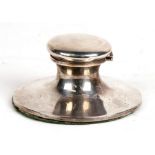 A George V silver Capstan inkwell, Birmingham 1918, 13cms (5ins) diameter.