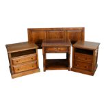 A Stanley Cumper of Salisbury, a pair of oak bedside tables; together with a matching lamp table and