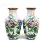A large pair of Chinese cloisonne vases decorated with flowers and birds on a white ground, 39cms (