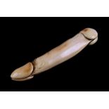 A late 19th / early 20th century carved ivory phallus, probably Japanese, 21cms (8.25ins) long.