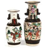 Two Chinese crackle glaze vases decorated with warriors, the largest 25cm (9.75ins) high.Condition