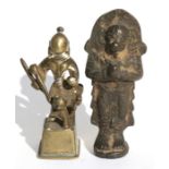 A pair of early bronze temple figures, one in the form of a praying monkey god, the other a figure
