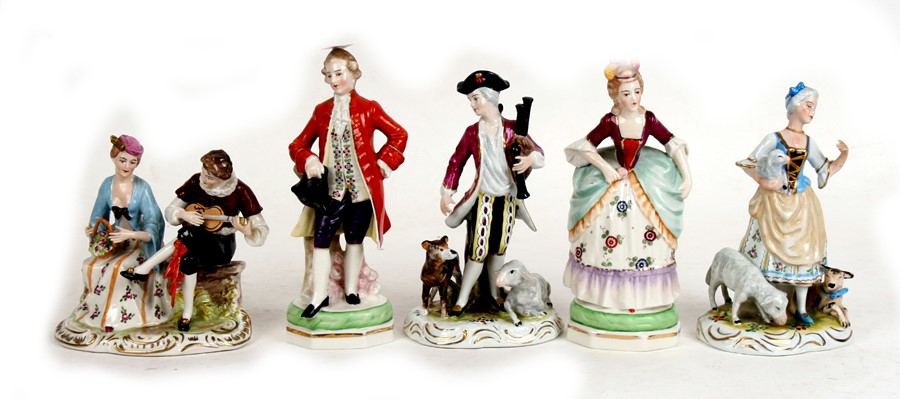 Five Meissen style figures and groups, the largest 19cms (7.5ins) high (5).