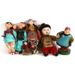 A group of antique and later Chinese and Japanese dolls, 26.5cms (10.5ins) high.